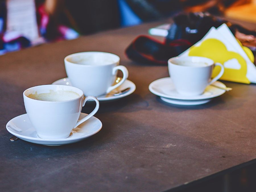 Standard white ceramic coffee cupping bowls used in professional cupping