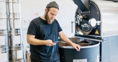 Coffee roaster analyzing roast progress to improve production efficiency without adding new equipment