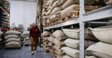 Green coffee inventory in warehouse illustrating roastery cash flow and budgeting decisions for 2026
