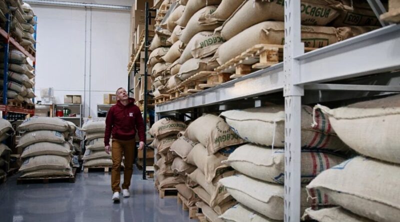 Green coffee inventory in warehouse illustrating roastery cash flow and budgeting decisions for 2026