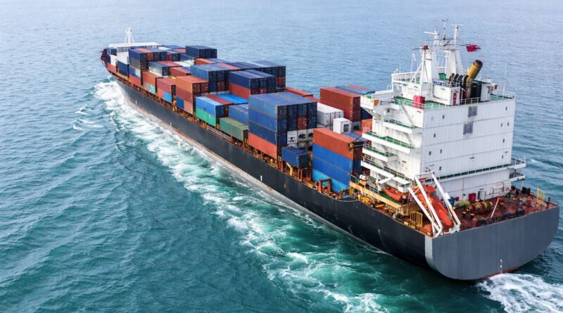 Container ship representing global coffee trade amid market uncertainty driven by weather risk, tight supply, and futures volatility