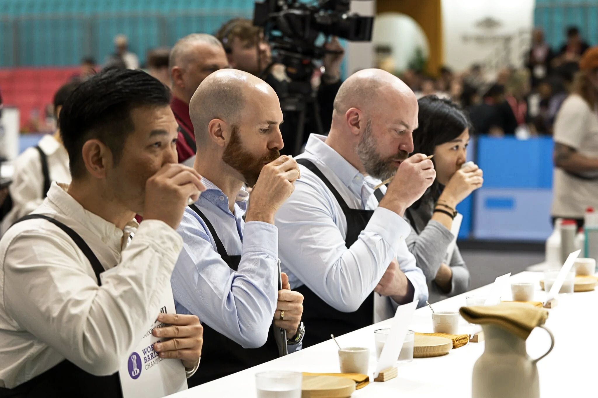 Cup of Excellence coffee cupping and green coffee auction showcasing top microlots from producing countries in 2026