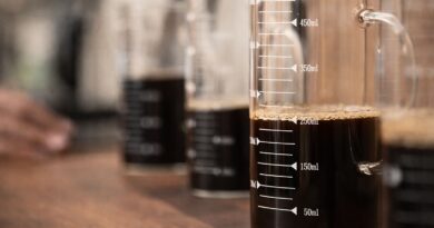 Cold brew coffee brewed with controlled extraction using precise coffee-to-water ratios in a glass measuring vessel